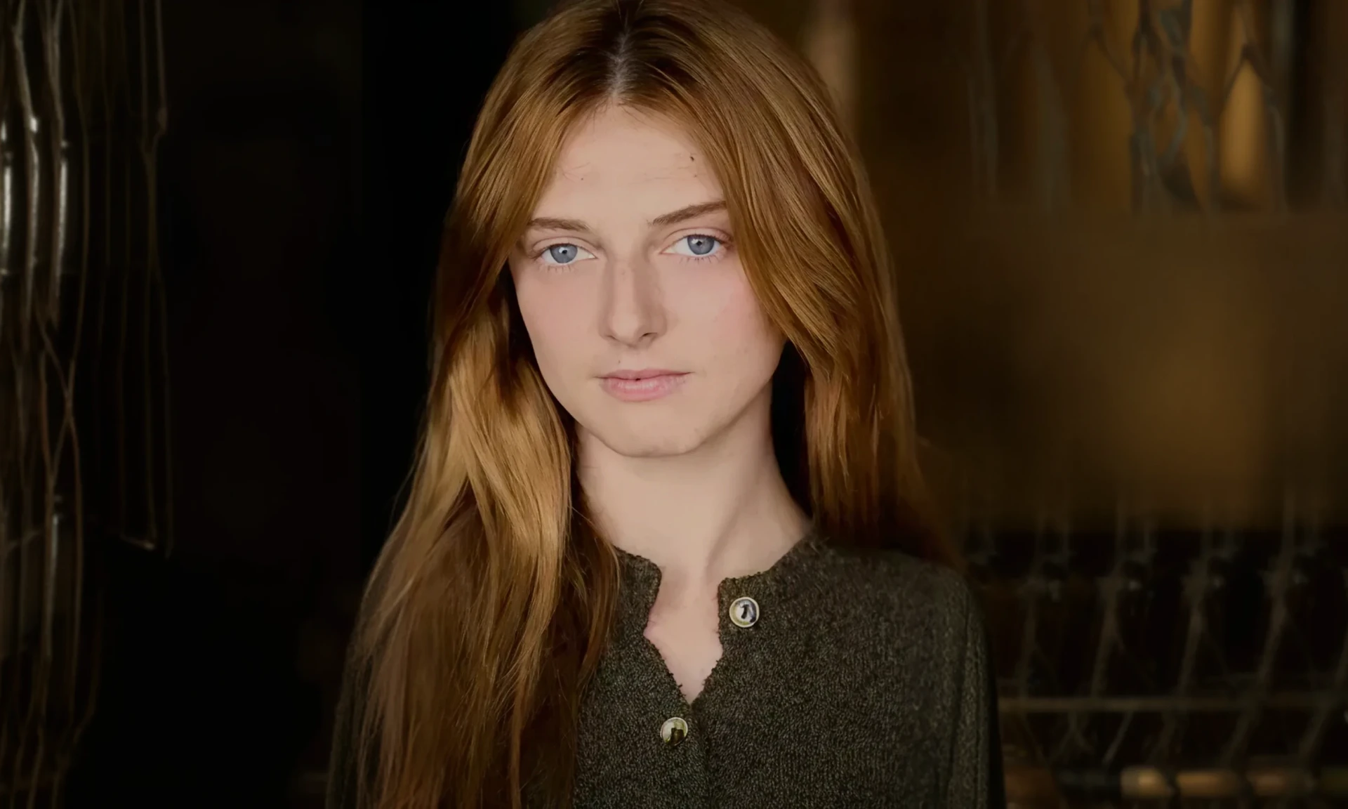 Red-haired woman in soft lighting