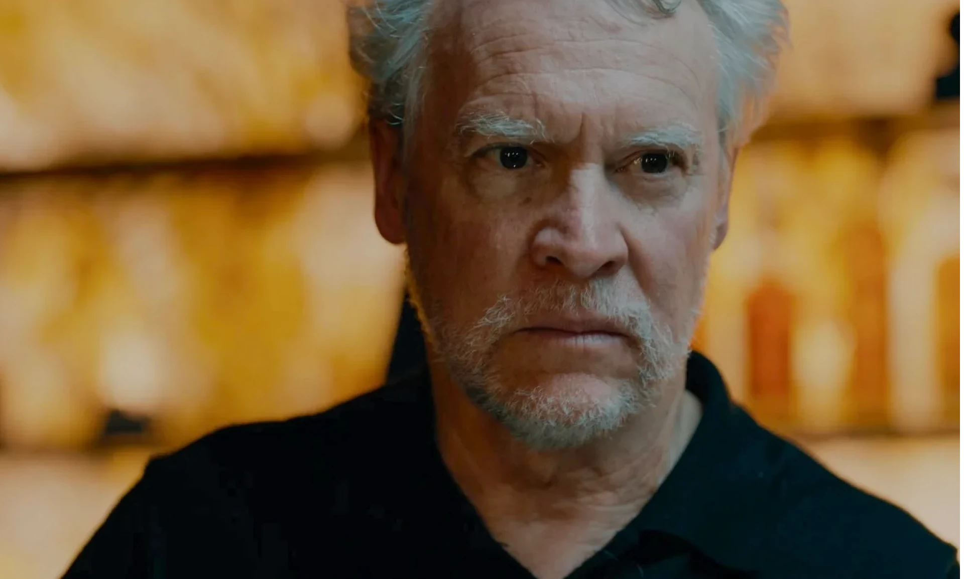 Elderly man with serious expression